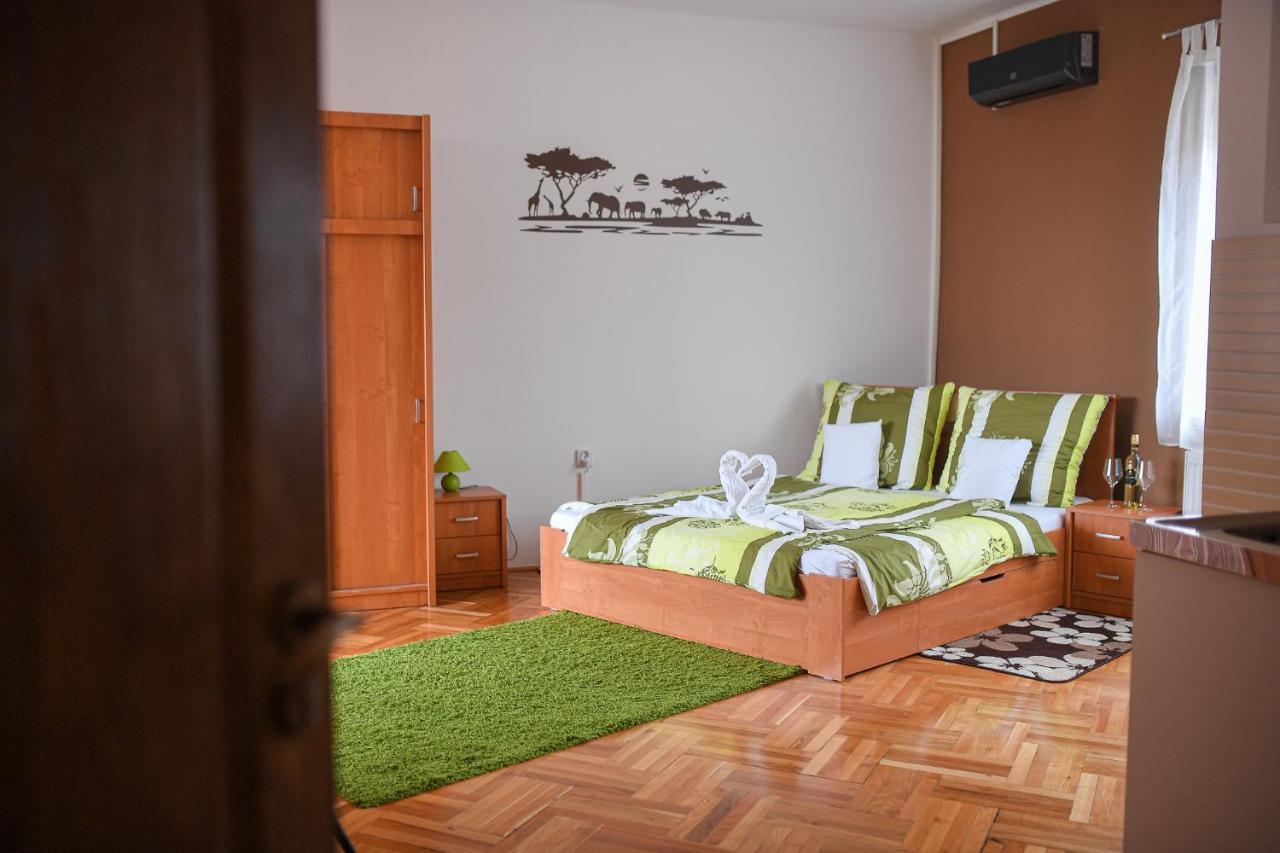 Kokusz Apartmanok Егер Стая снимка