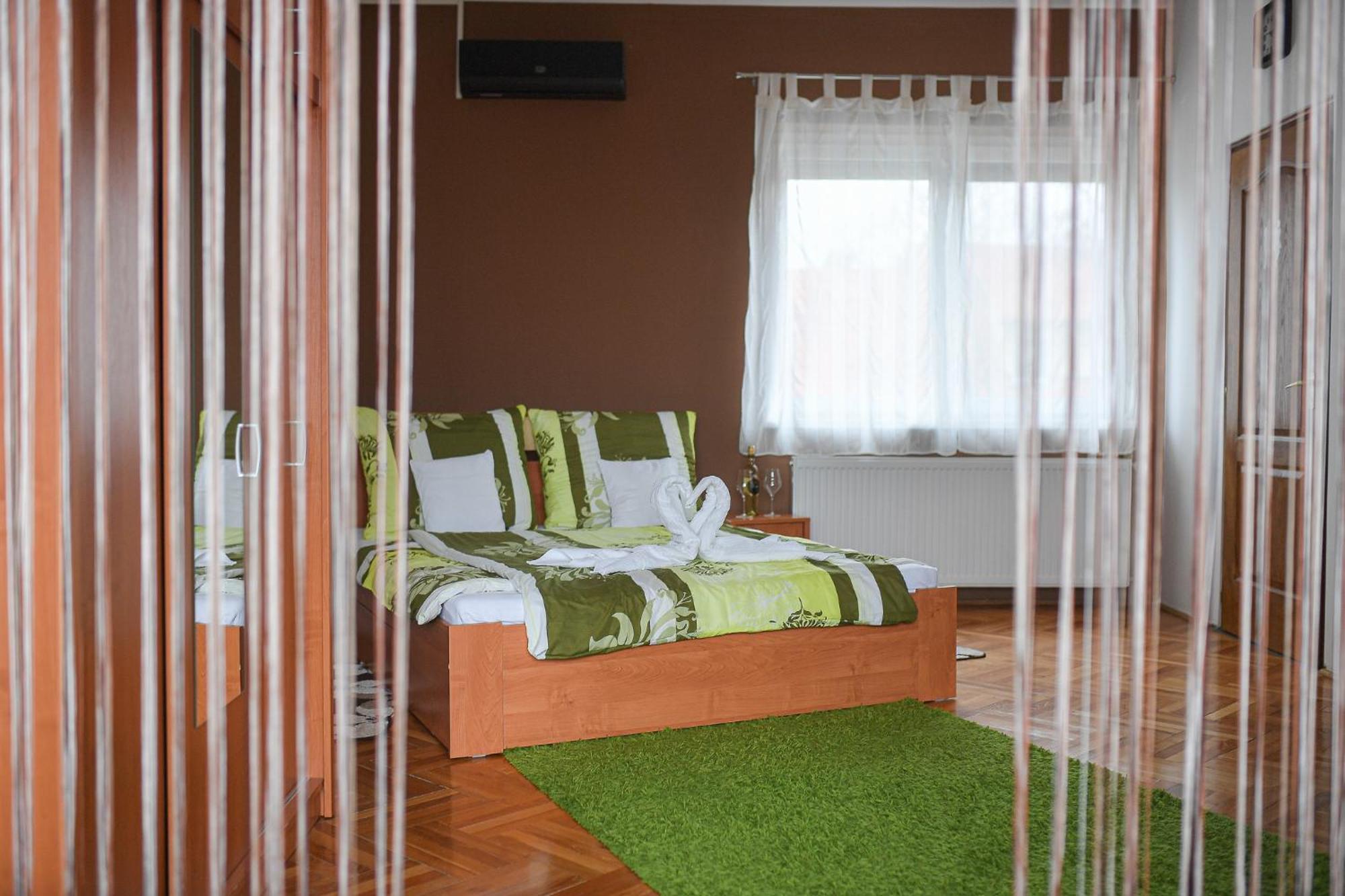Kokusz Apartmanok Егер Стая снимка