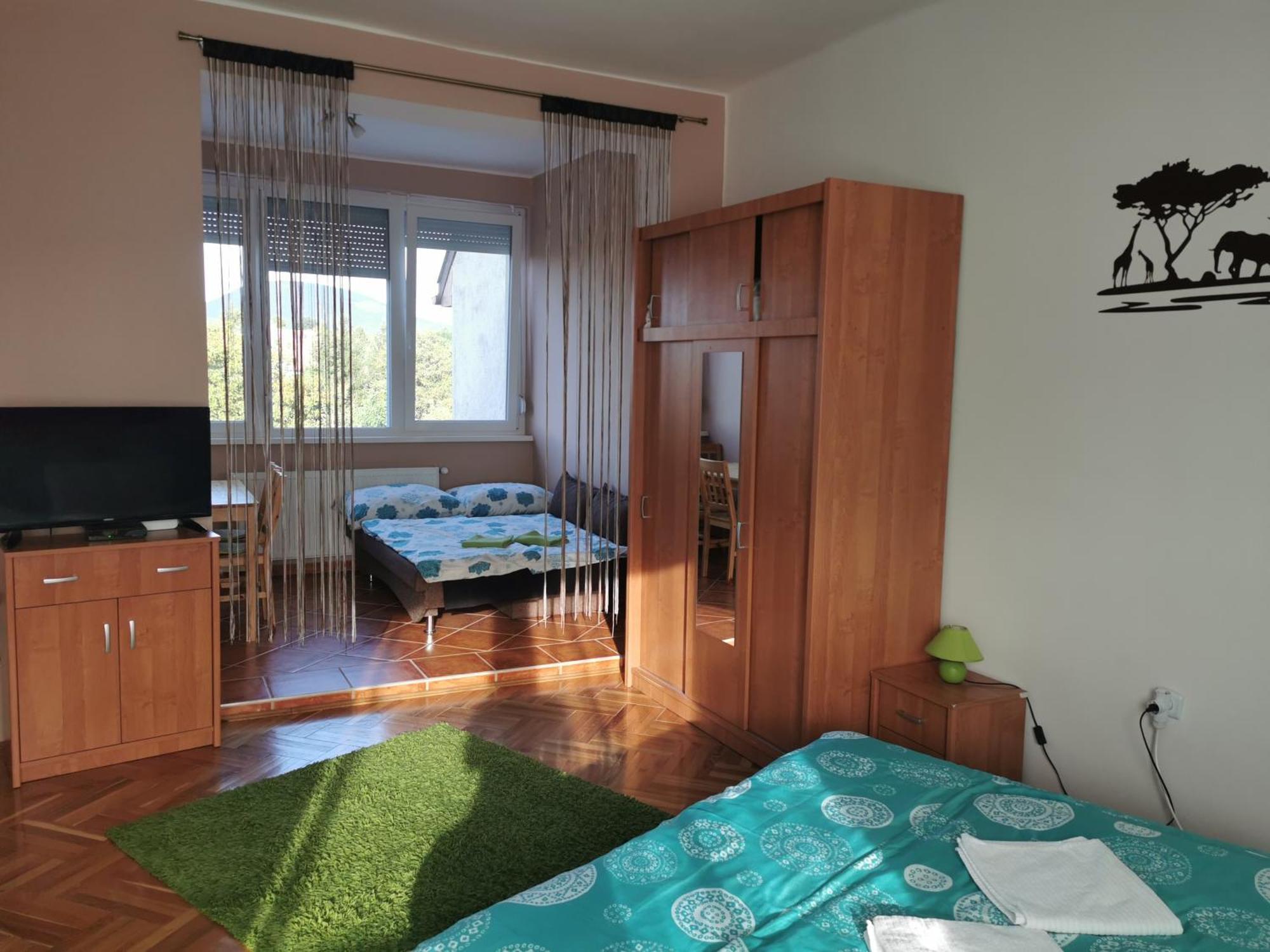 Kokusz Apartmanok Егер Стая снимка